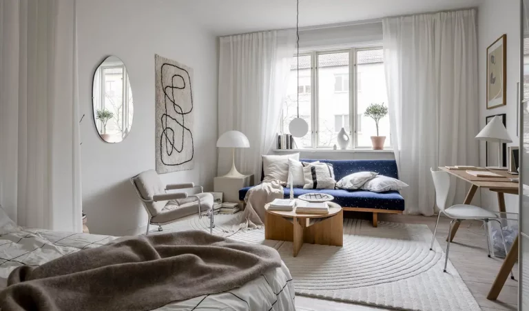 Un appartement à la déco moderne et aux notes de bleu