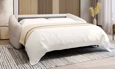 Canapé convertible déplié en position lit dans un salon moderne