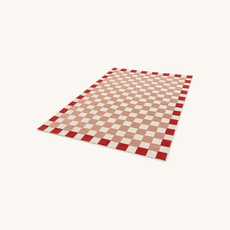 Tapis poils ras myrlie motif damier rose chez Bobochic