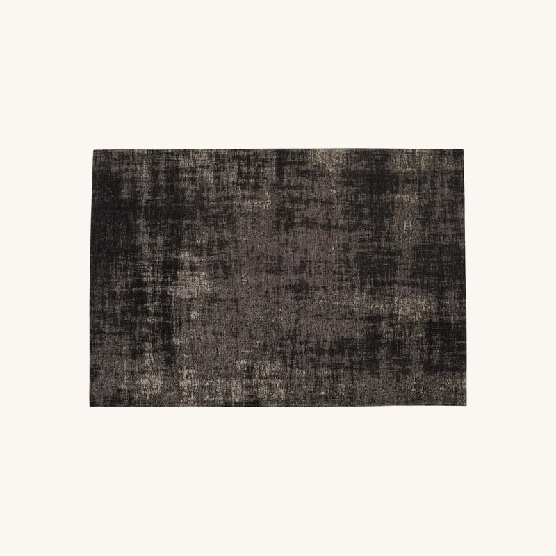 Tapis tissé jacquard noir chez Maisons du Monde