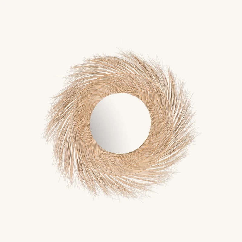 Miroir rond en rotin chez Maisons du Monde