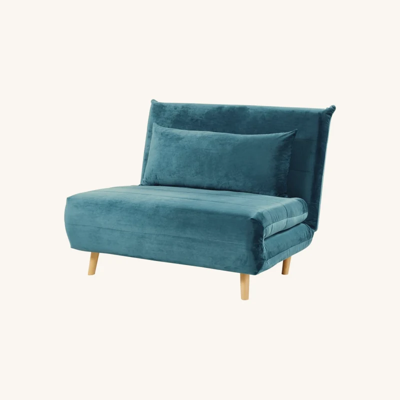 Canapé convertible 1 place bleu pétrole chez Maisons du Monde