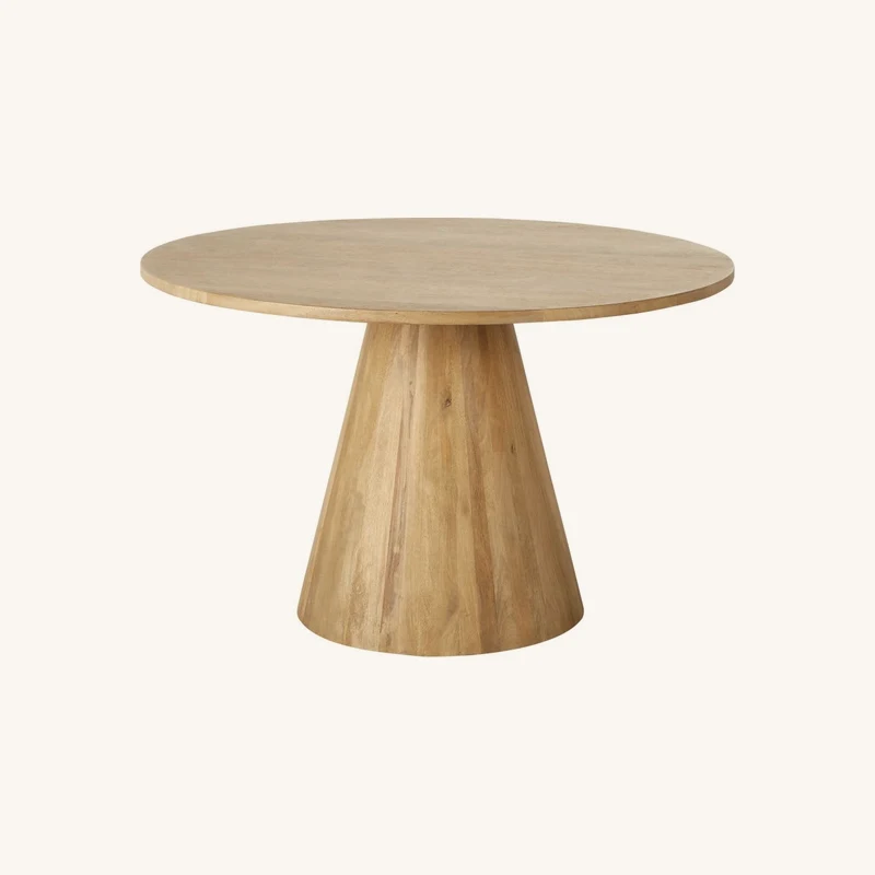 Table à manger ronde en manguier massif blanchi chez Maisons du Monde