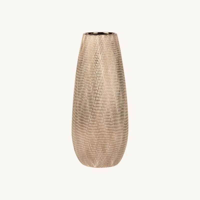 Vase en porcelaine dorée chez Maisons du Monde