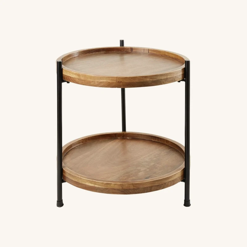 Bout de canapé en bois de manguier et fer forgé chez Maisons du Monde