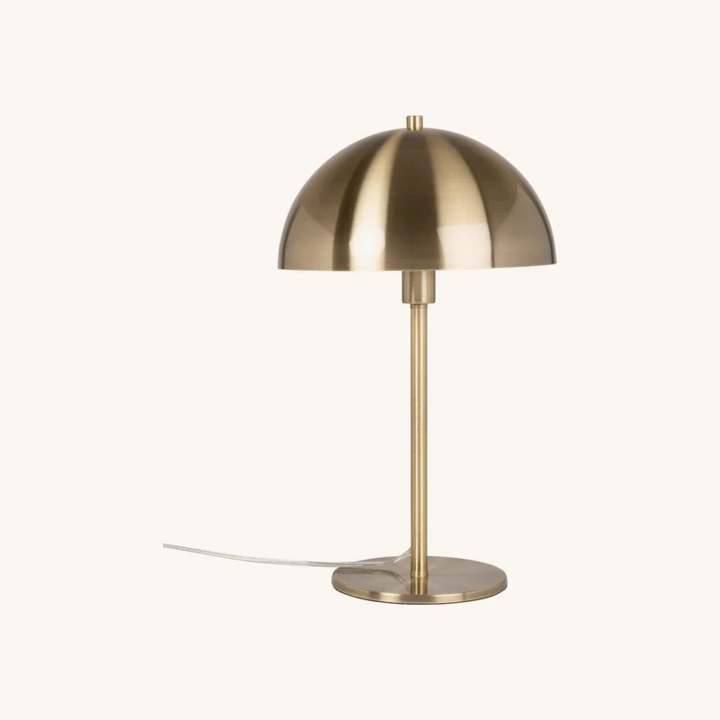 Lampe en acier doré chez Maisons du Monde