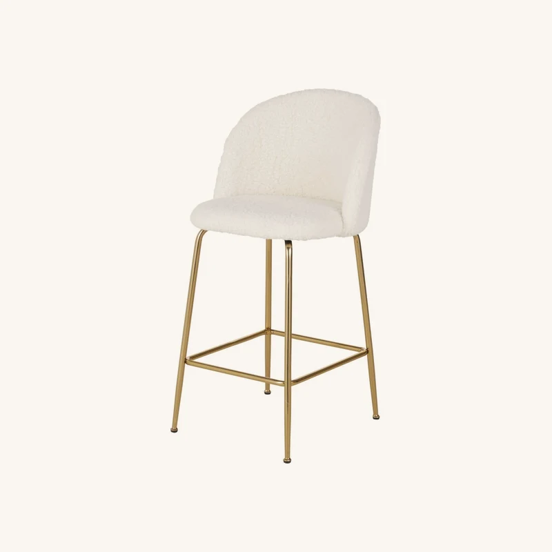 Chaise pour îlot central bouclettes blanches chez Maisons du Monde