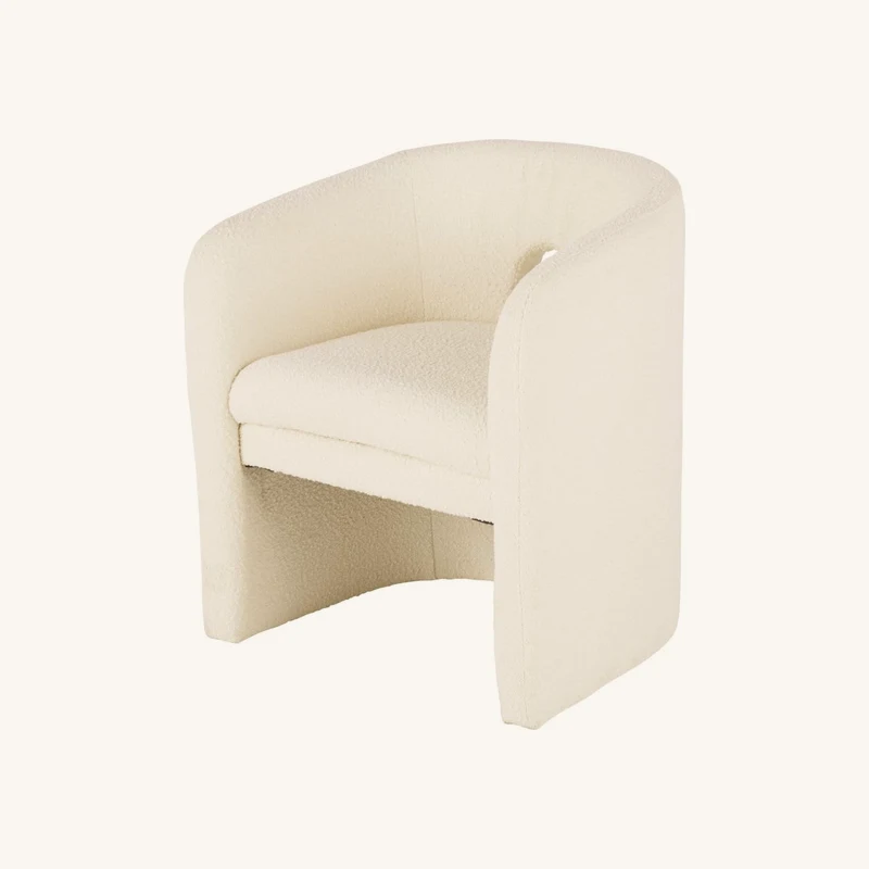 Fauteuil de table bouclettes blanches chez Maisons du Monde