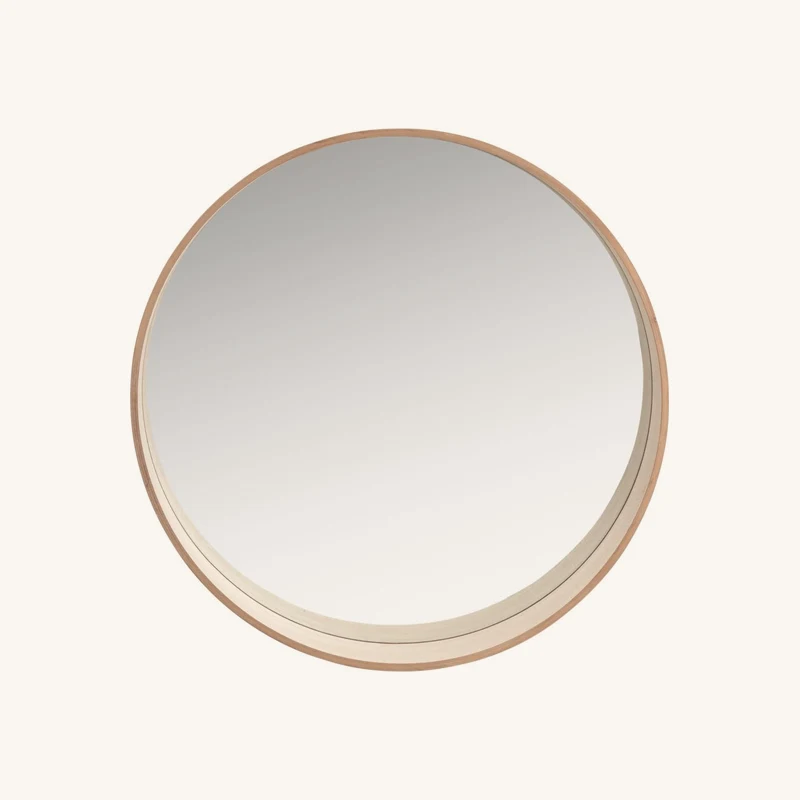 Miroir rond beige chez Maisons du Monde