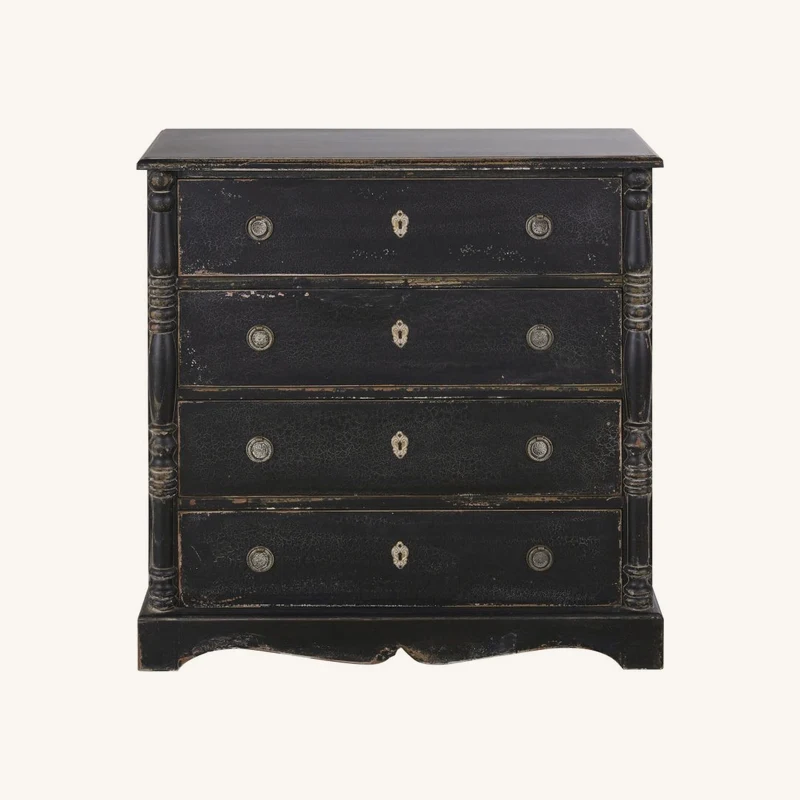 Commode haute 4 tiroirs noire et métal coloris chez Maisons du Monde