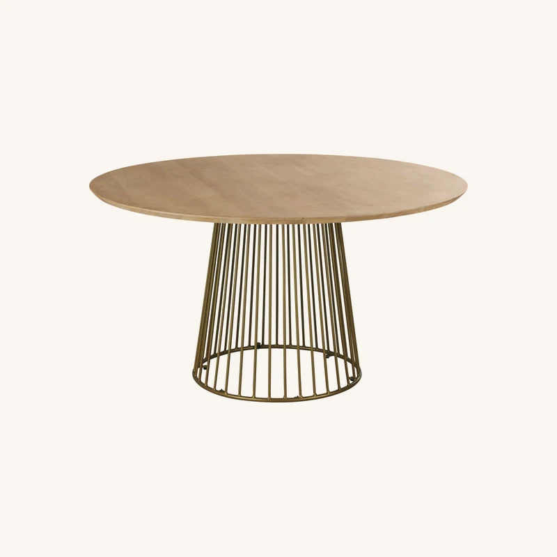 Table à manger ronde en bois de manguier chez Maisons du Monde