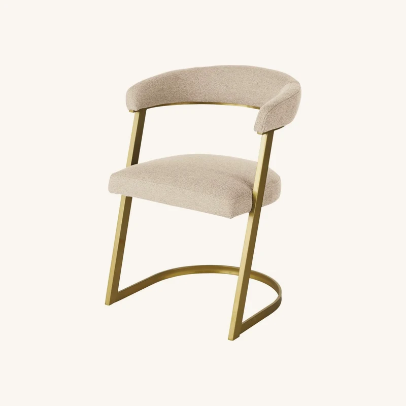 Fauteuil de table écru chiné et acier coloris chez Maisons du Monde
