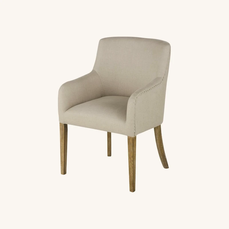 Fauteuil à dîner en lin beige ficelle chez Maisons du Monde