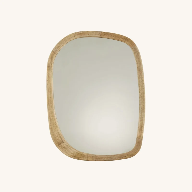 Miroir organique en bois de manguier chez Maisons du Monde