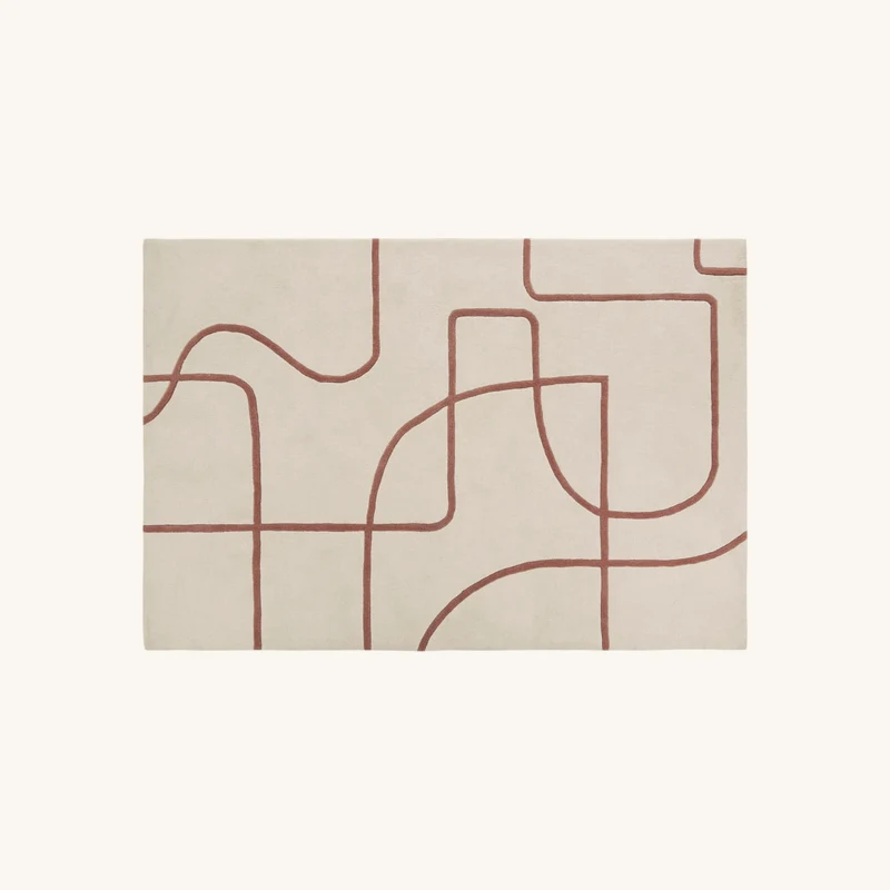 Tapis tufté en laine et coton écru et terracotta chez Maisons du Monde
