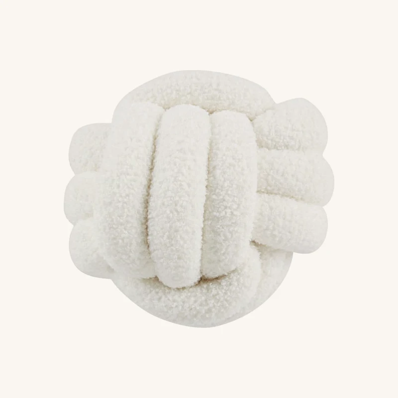 Coussin bouclettes écrues chez Maisons du Monde