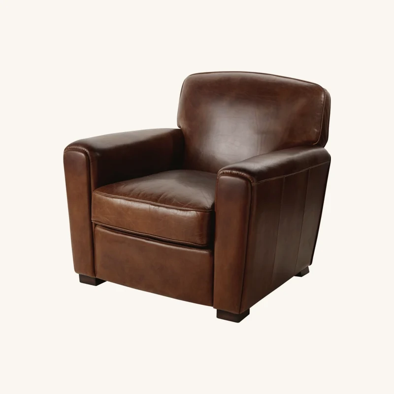Fauteuil club en cuir marron effet vieilli chez Maisons du Monde