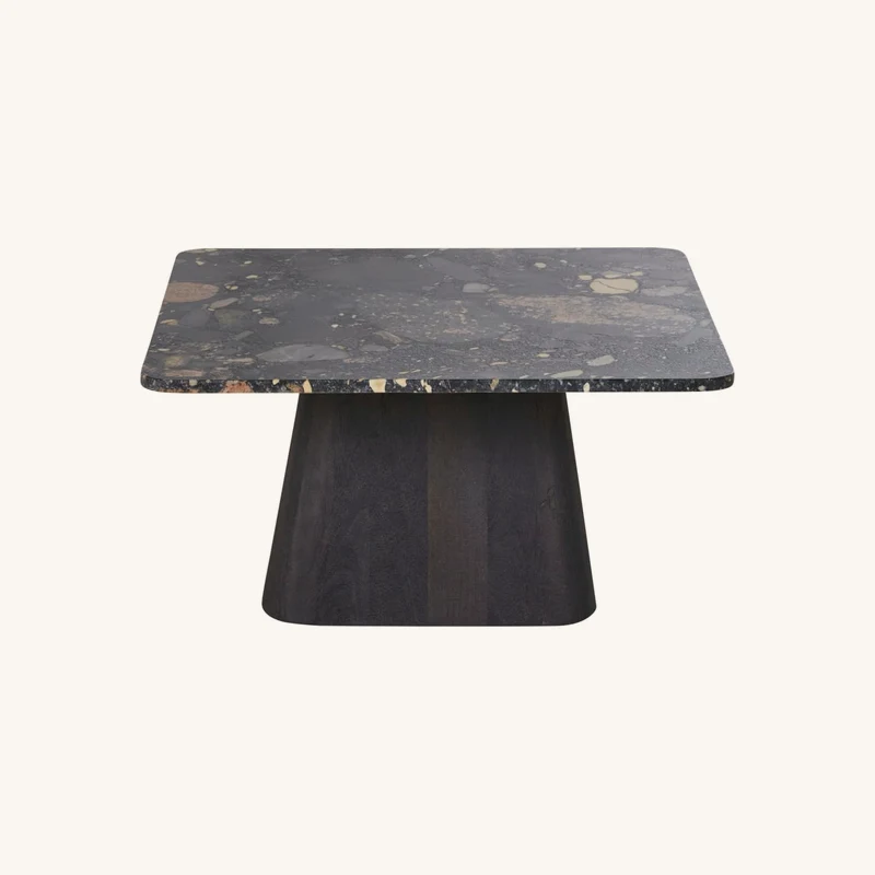 Table basse en pierre et bois de manguier chez Maisons du Monde