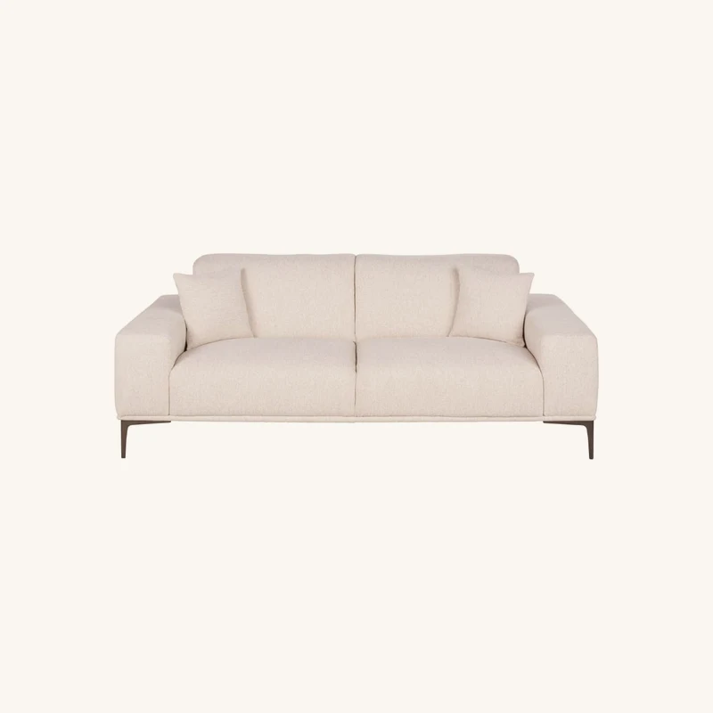 Canapé 2 places beige chez Maisons du Monde