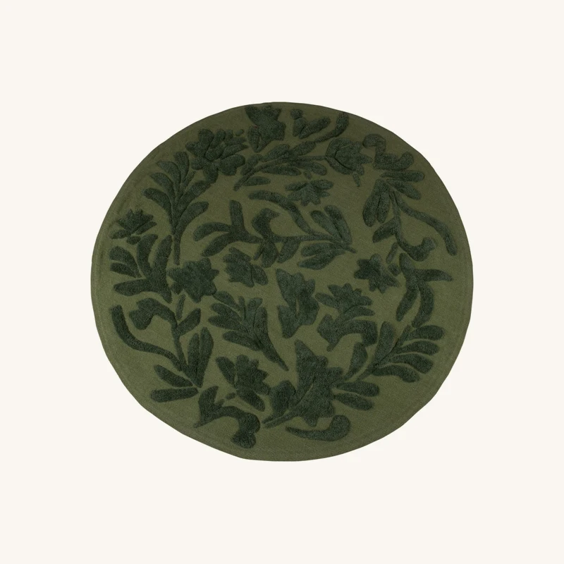 Tapis rond en coton vert tufté chez Maisons du Monde