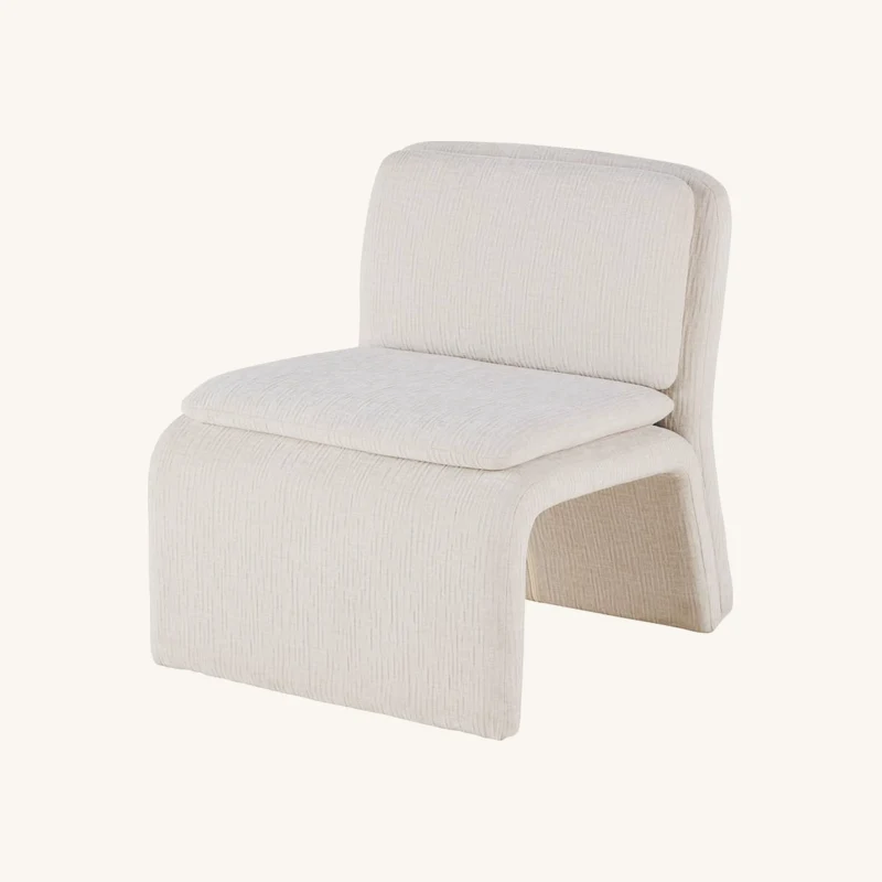 Fauteuil en textile embossé blanc chez Maisons du Monde
