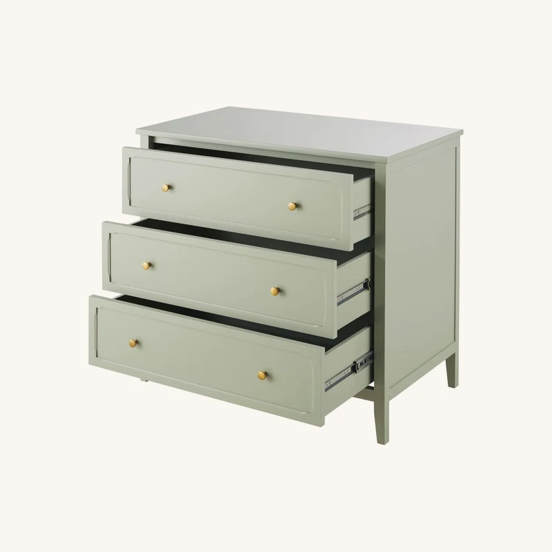 Commode vert clair et coloris laiton chez Maisons du Monde