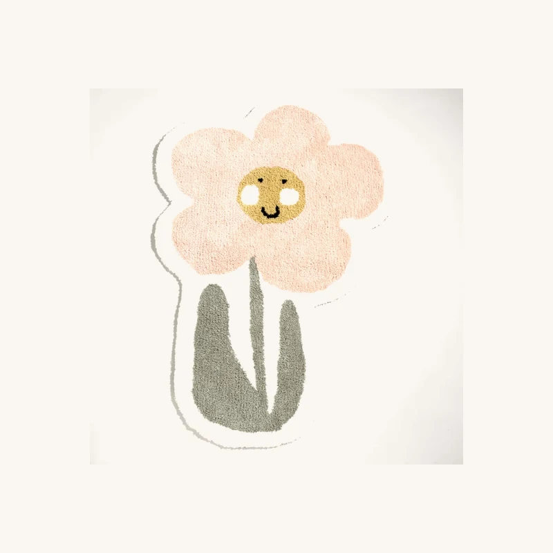 Tapis fleur en laine tuftée chez Maisons du Monde