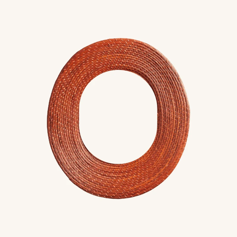 Miroir ovale en palmier rouge chez The Cool Republic