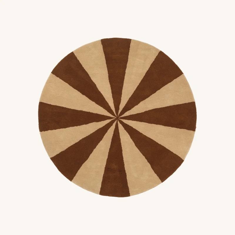 Tapis rond brique et blanc chez The Cool Republic
