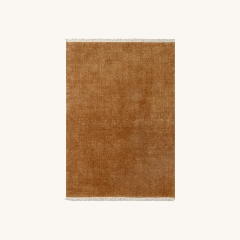 Tapis en laine brun doré chez The Cool Republic