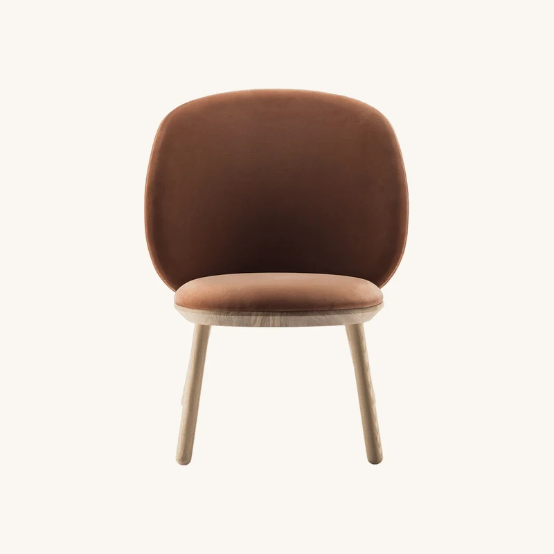 Fauteuil en velours terracotta chez The Cool Republic