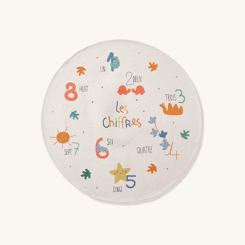 Tapis rond chiffres artiste écru chez Vertbaudet