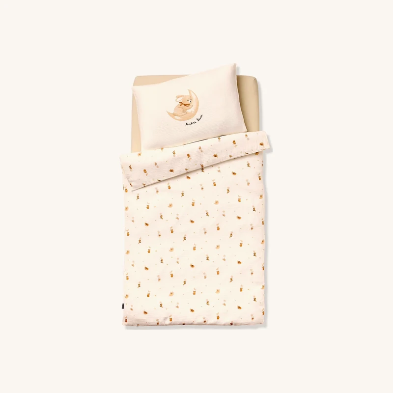 Parure housse de couette bébé gaze coton blanc chez Vertbaudet