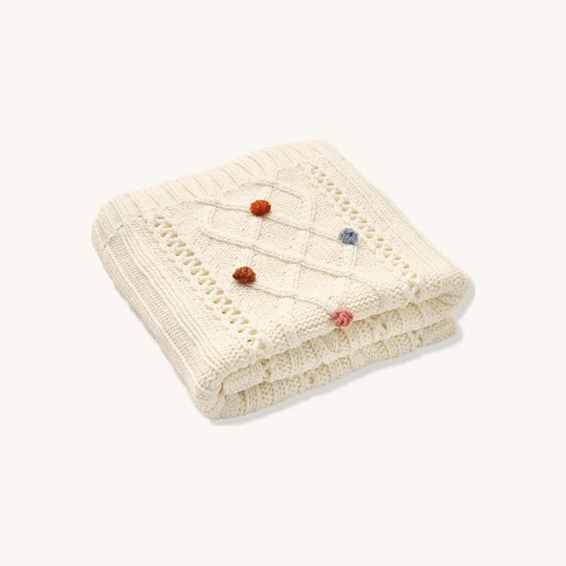 Couverture tricot happy bohème écru chez Vertbaudet